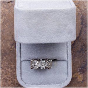 Sterling silver flower band.